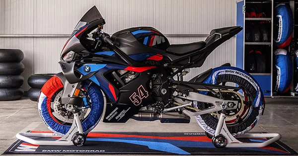 BMW M 1000 RR superbike leaned hard through a track corner