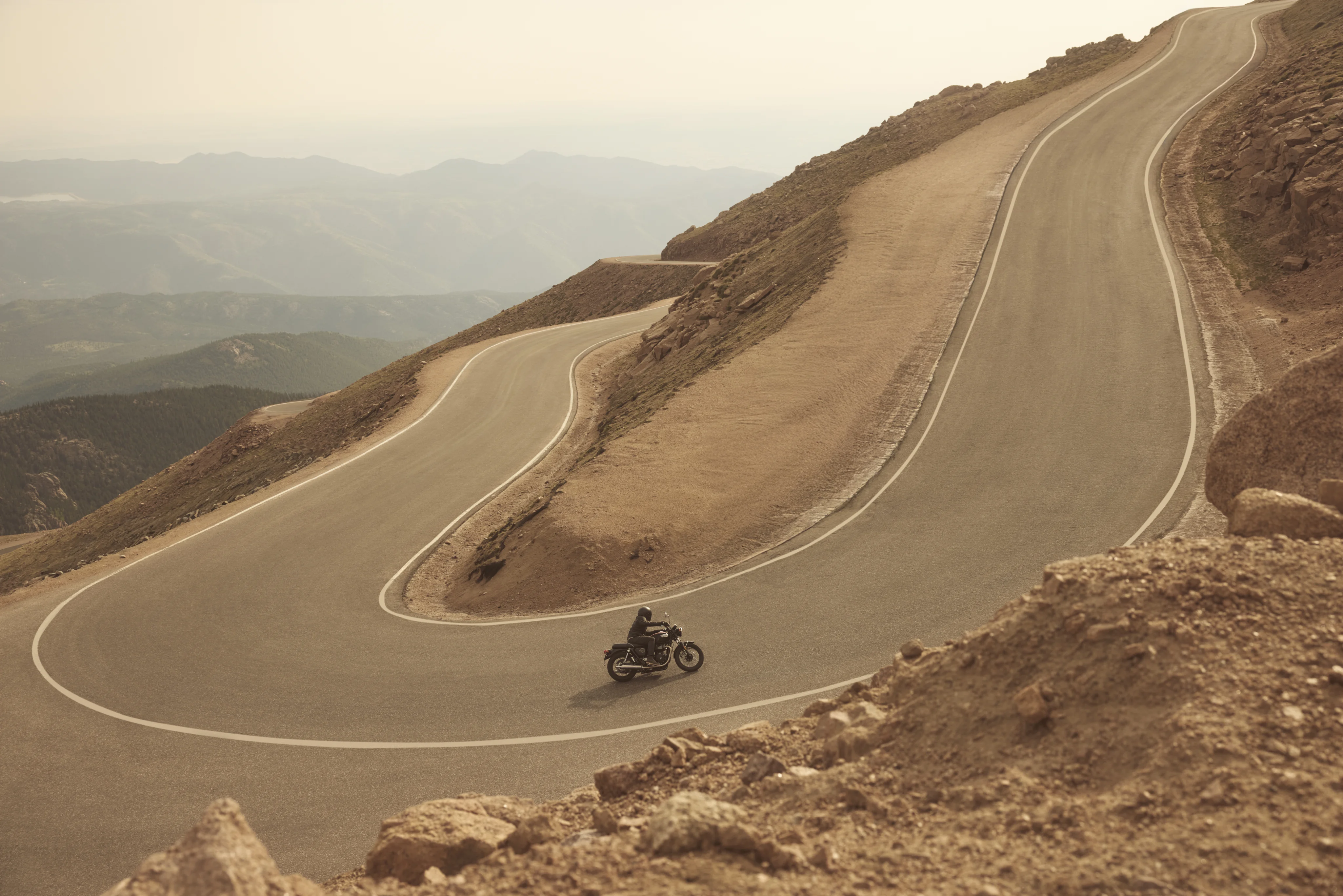 2027 Triumph Bonneville T100 motorcycle shown from the side outdoors.
